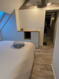 Postel nebo postele na pokoji v ubytování Résidence des 3 îles, en plein centre-ville, à 5 min des plages, 3 appartements neufs