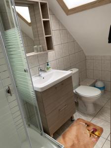A bathroom at Németh Vendégház Még 34 kép
