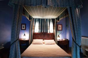 Cama o camas de una habitación en Hospederia Meson de la Dolores