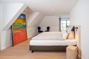Un pat sau paturi într-o cameră la Rickmer's Hoff