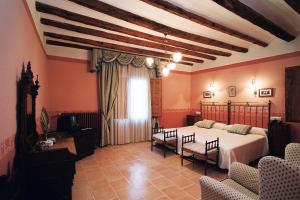 Cama o camas de una habitación en Hospederia Meson de la Dolores
