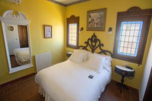 Posteľ alebo postele v izbe v ubytovaní Hotel Soho Boutique Palacio San Gabriel