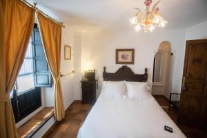 Posteľ alebo postele v izbe v ubytovaní Hotel Soho Boutique Palacio San Gabriel