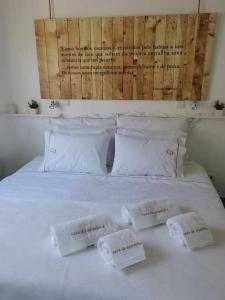 Postel nebo postele na pokoji v ubytování Casa da Arquinha