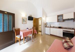 Kuchyň nebo kuchyňský kout v ubytování Apartments Magdalena