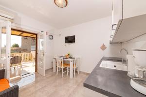 Kuchyň nebo kuchyňský kout v ubytování Apartments Magdalena