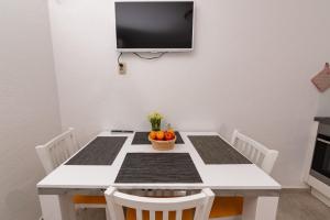 TV a/nebo společenská místnost v ubytování Apartments Magdalena