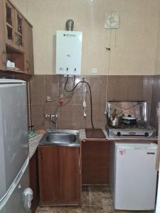 Kuchyň nebo kuchyňský kout v ubytování Guest House Nua