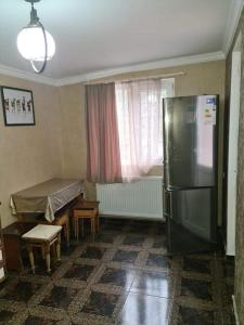 Kuchyň nebo kuchyňský kout v ubytování Guest House Nua