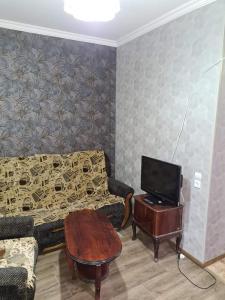 TV a/nebo společenská místnost v ubytování Guest House Nua