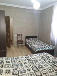 Postel nebo postele na pokoji v ubytování Guest House Nua