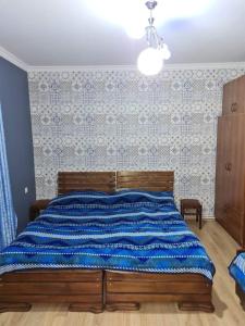 Postel nebo postele na pokoji v ubytování Guest House Nua