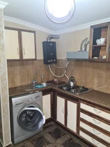 Kuchyň nebo kuchyňský kout v ubytování Guest House Nua