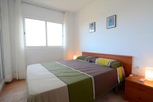 Postel nebo postele na pokoji v ubytování Port Pals E 202 + 18 fotografií