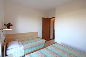 Postel nebo postele na pokoji v ubytování Albatros