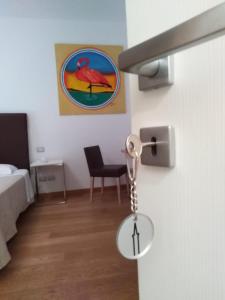 a key chain hanging from a door in a room at Belo Horizonte in Civitanova Marche