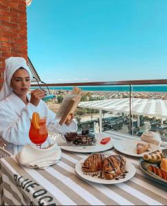 Thức uống tại Fishta Hotel & Apartments
