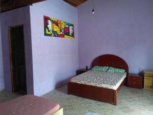 Una cama o camas en una habitación de Recanto da Paz Fyona