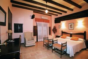 Cama o camas de una habitación en Hospederia Meson de la Dolores