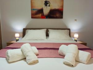 A bed or beds in a room at Villa Amaryllis