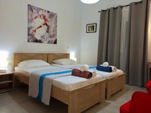 A bed or beds in a room at Villa Amaryllis