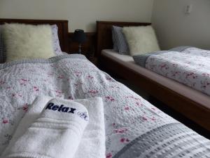 Postel nebo postele na pokoji v ubytování Pension MAX