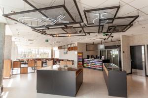 a lobby of a store with a counter in it at ibis Caucaia Porto do Pecem in Caucaia