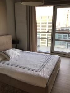 Postel nebo postele na pokoji v ubytování Platinum Towers Hotel Apartments