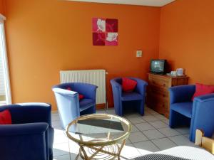 Posezení v ubytování Hotel Dry Les Courtis