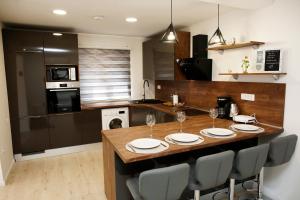 Kuchyň nebo kuchyňský kout v ubytování Pearl Apartment