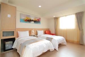 Voodi või voodid majutusasutuse Clownfish Resort toas