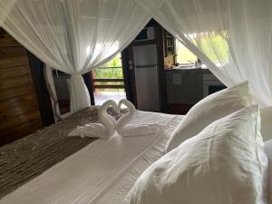Posteľ alebo postele v izbe v ubytovaní Domaine Karaibes