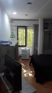 Postel nebo postele na pokoji v ubytování Céntrico A-05