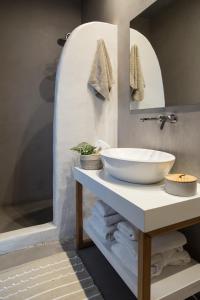 A bathroom at Impressive One