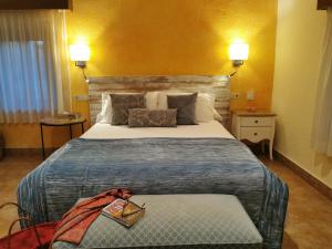Posteľ alebo postele v izbe v ubytovaní Hotel Sant Joan