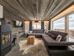 A seating area at Amazing Chalet near Wildkogel Ski Arena