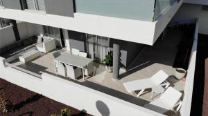 Balkon lub taras w obiekcie A beautiful apartment with a beach view - La Tejita - El Medano