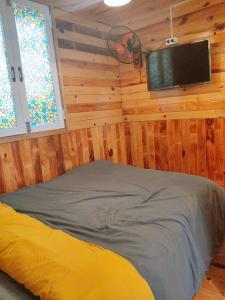 Postel nebo postele na pokoji v ubytování Ziczac Homestay Đà Lạt