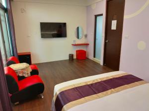 TV a/nebo společenská místnost v ubytování Purple Shell Homestay + 15 fotografií