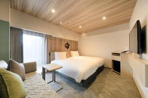 Giường trong phòng chung tại Richmond Hotel Morioka Ekimae