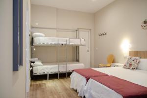 Posteľ alebo postele v izbe v ubytovaní Integralix Lofts