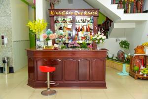 La sala de estar o bar de Thanh Tung Hotel