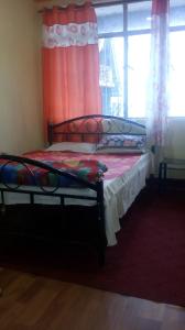 Postel nebo postele na pokoji v ubytování Backpackers Hostel
