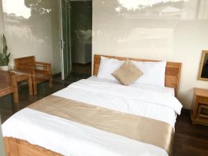 Postel nebo postele na pokoji v ubytování Spring Hotel