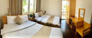 Postel nebo postele na pokoji v ubytování Spring Hotel