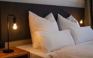 Voodi või voodid majutusasutuse Le Baldinger Boutique Hotel toas