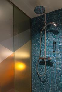 Vannituba majutusasutuses Le Baldinger Boutique Hotel