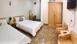 Postel nebo postele na pokoji v ubytování Spring Hotel