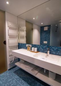 Vannituba majutusasutuses Le Baldinger Boutique Hotel