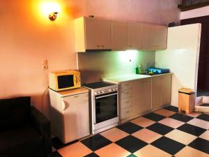 Kuchyňa alebo kuchynka v ubytovaní Belou apartment